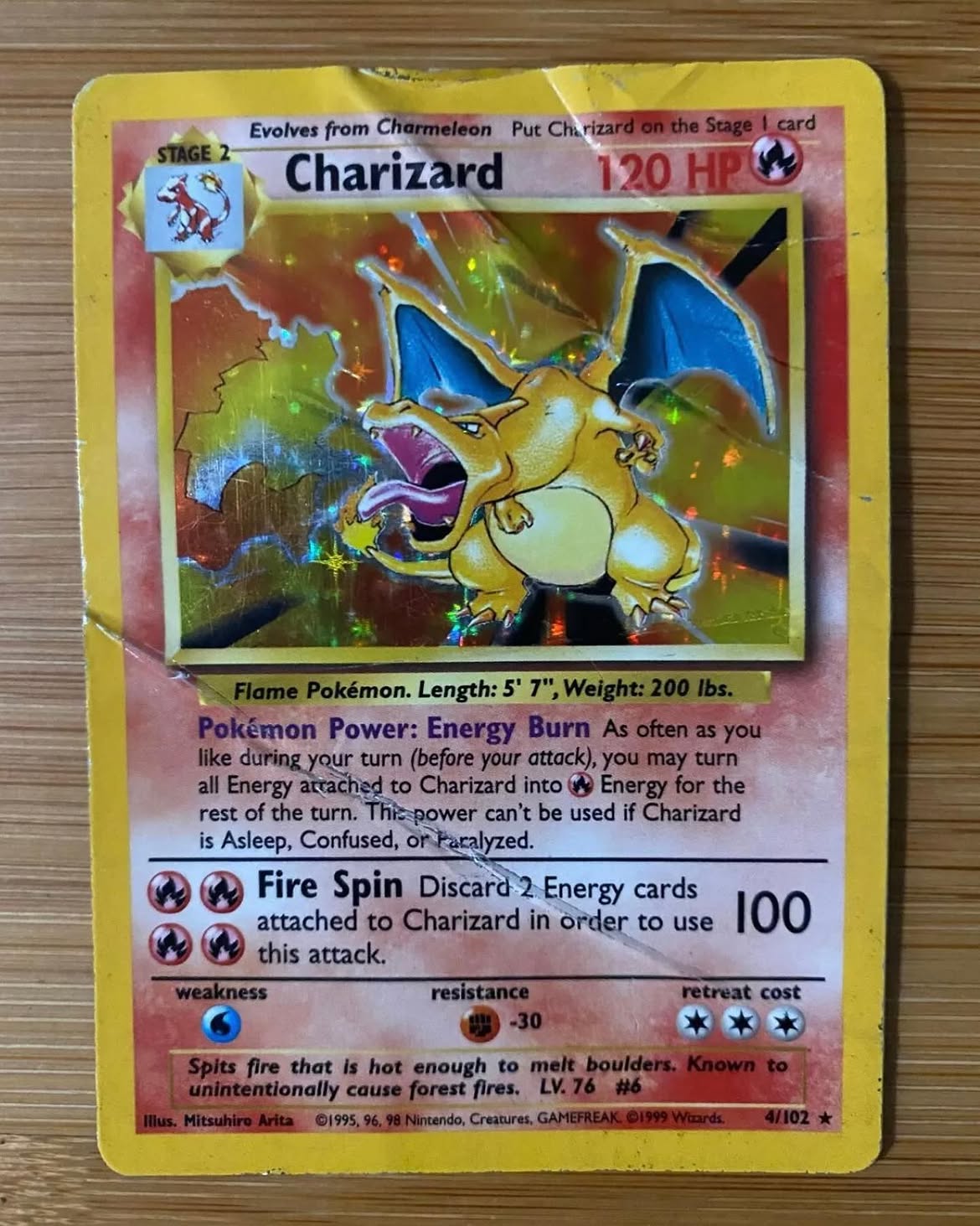 Charizard card before restoration